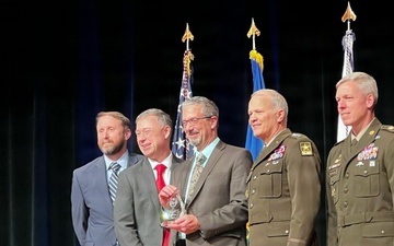 Marc Busala wins AAE award