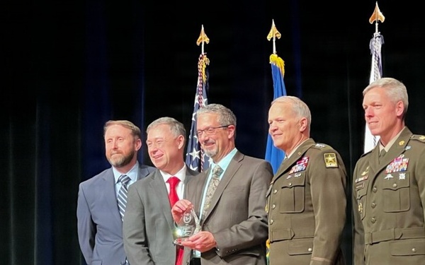 Marc Busala wins AAE award