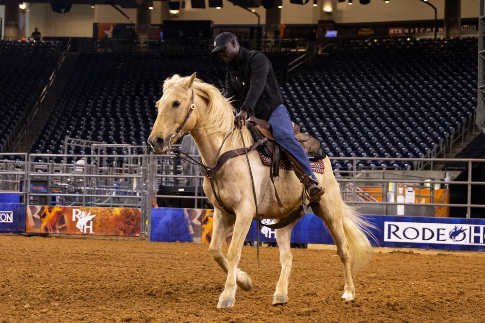 U.S. Marine Corps Mounted Color Guard presents the colors at the Houston Rodeo