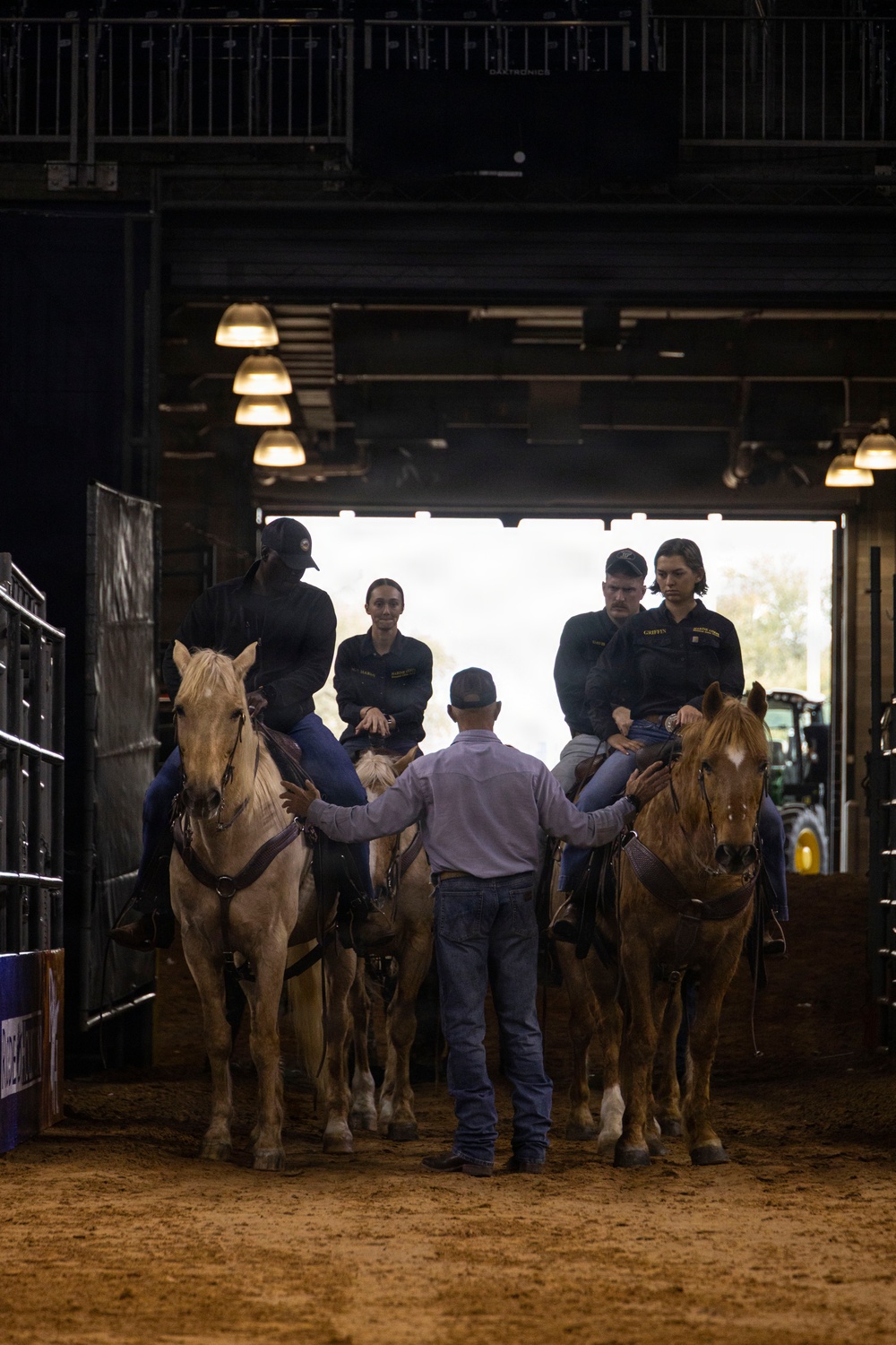 U.S. Marine Corps Mounted Color Guard presents the colors at the Houston Rodeo