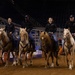 U.S. Marine Corps Mounted Color Guard presents the colors at the Houston Rodeo