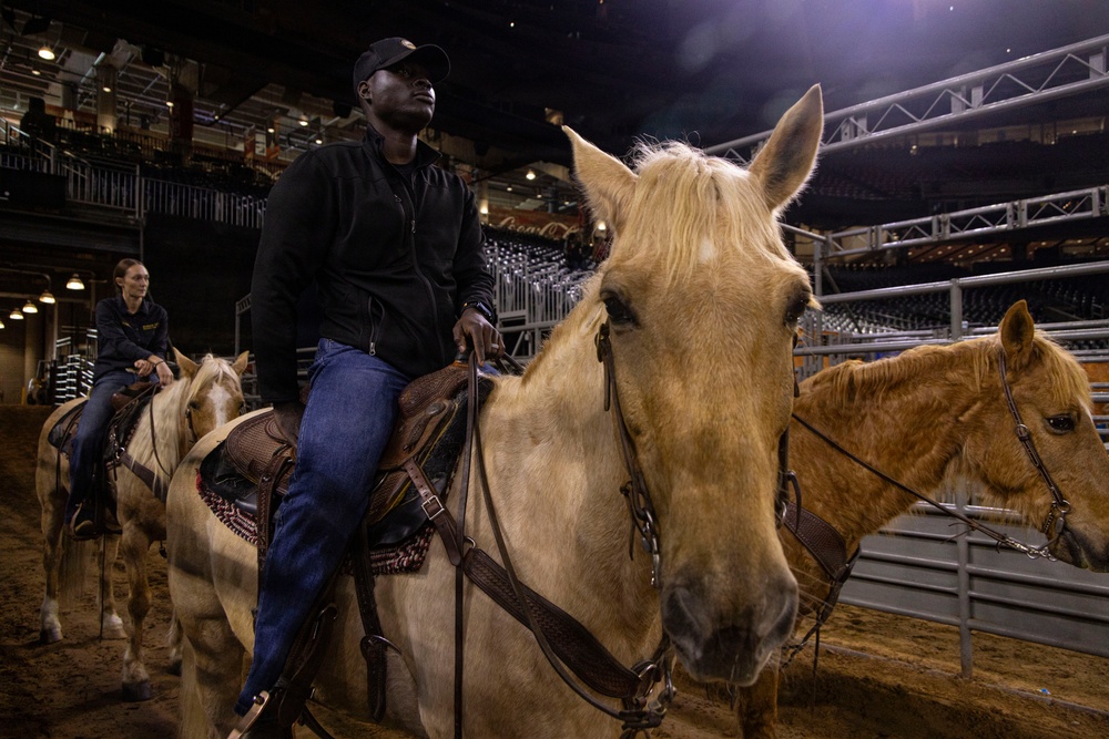 U.S. Marine Corps Mounted Color Guard presents the colors at the Houston Rodeo