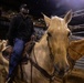 U.S. Marine Corps Mounted Color Guard presents the colors at the Houston Rodeo