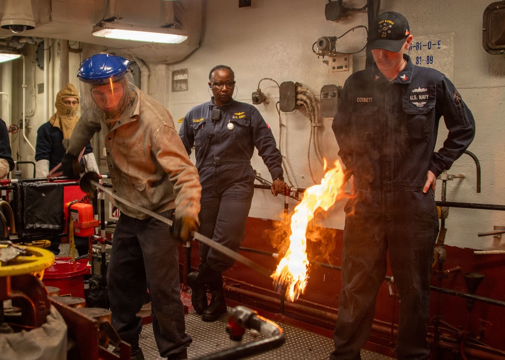 USS Essex Engineers work in forward and aft Main Machinery Rooms