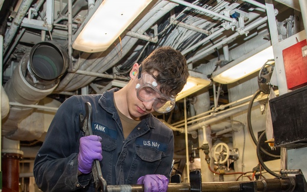 USS Essex Engineers work in forward and aft Main Machinery Rooms