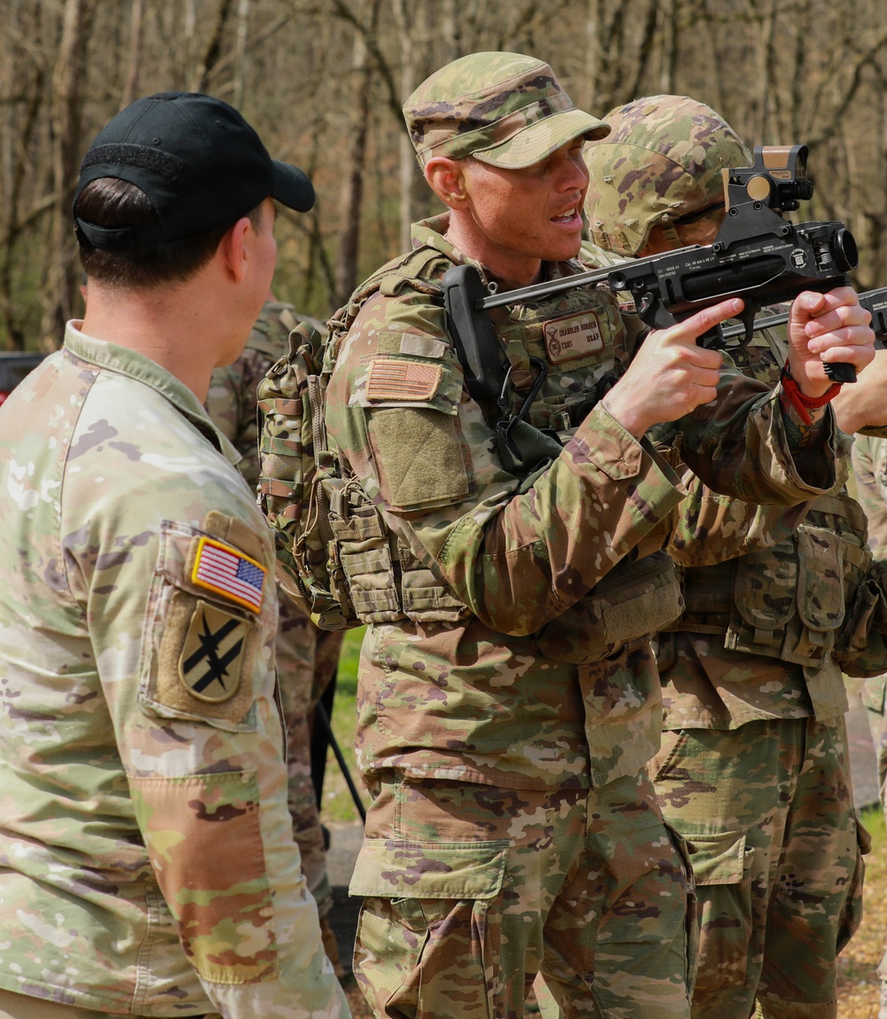 Airman Practices M320 Aiming