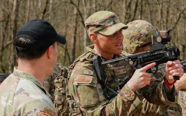 Airman Practices M320 Aiming