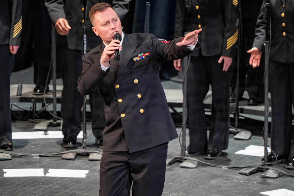 Musician 1st Class Nate Buttram of the US Navy Band Sea Chanters perform at the Latchis Theater in Brattleboro, TN