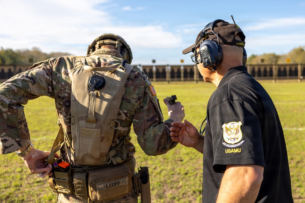 AMU Cadre Clears M17 Pistol Held by OC/T