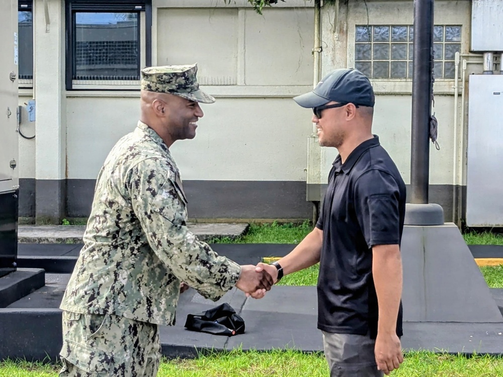 Admiral Tobias executes OICC MCM all hands and coin presentation