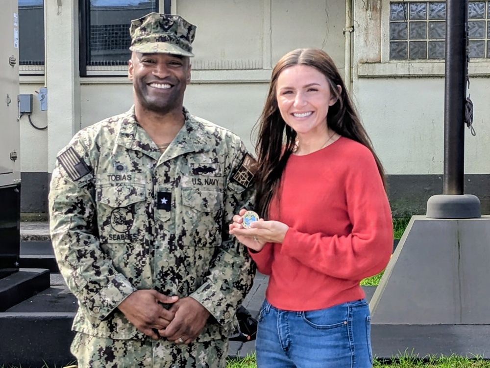 Admiral Tobias executes OICC MCM all hands and coin presentation