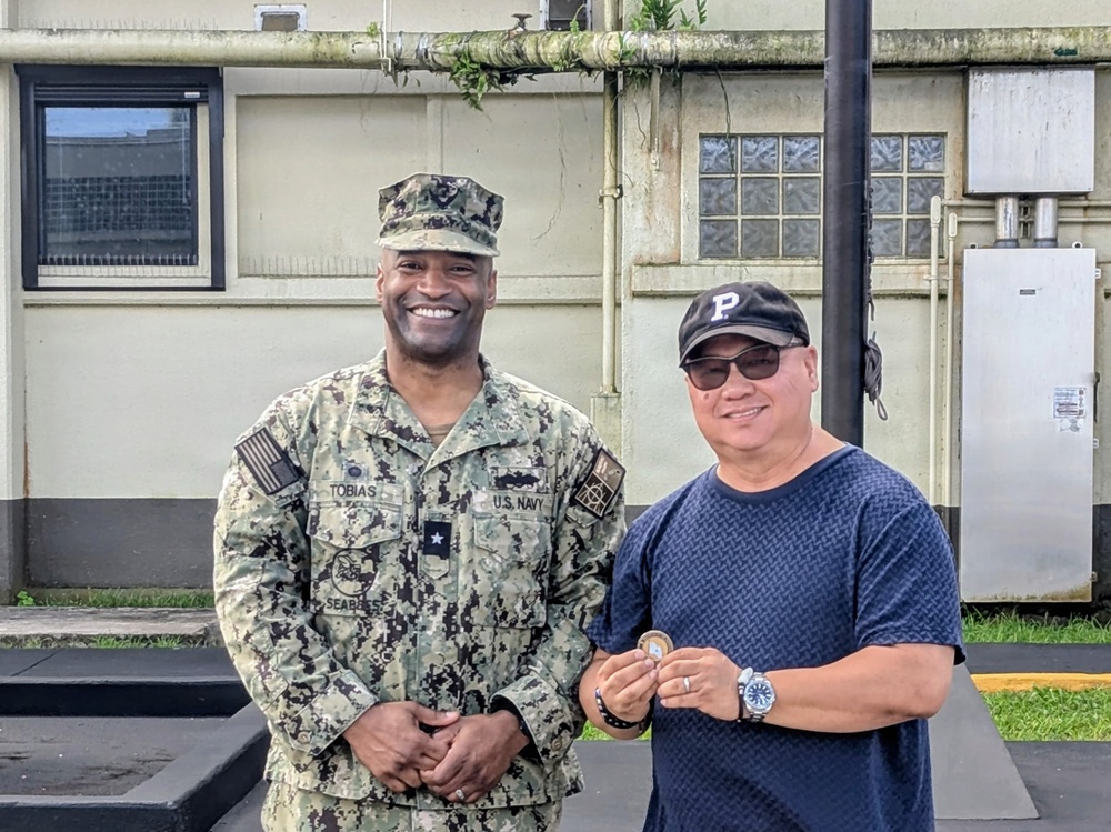 Admiral Tobias executes OICC MCM all hands and coin presentation