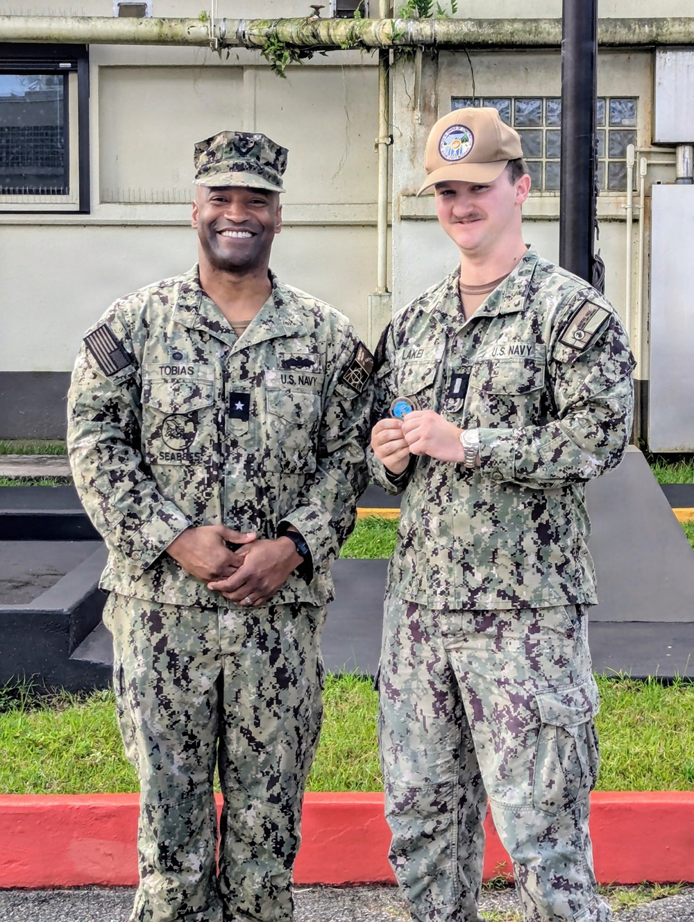 Admiral Tobias executes OICC MCM all hands and coin presentation