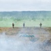 U.S. Soldiers execute team maneuvers during live fire training