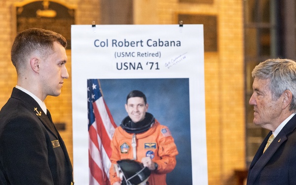 Astronauts meet with midshipmen during Astronaut Convocation event at U.S. Naval Academy