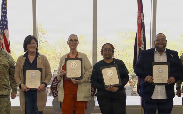 Soldiers and civilian staff from Martin Army Community Hospital are recognized during the hospital’s quarterly awards ceremony
