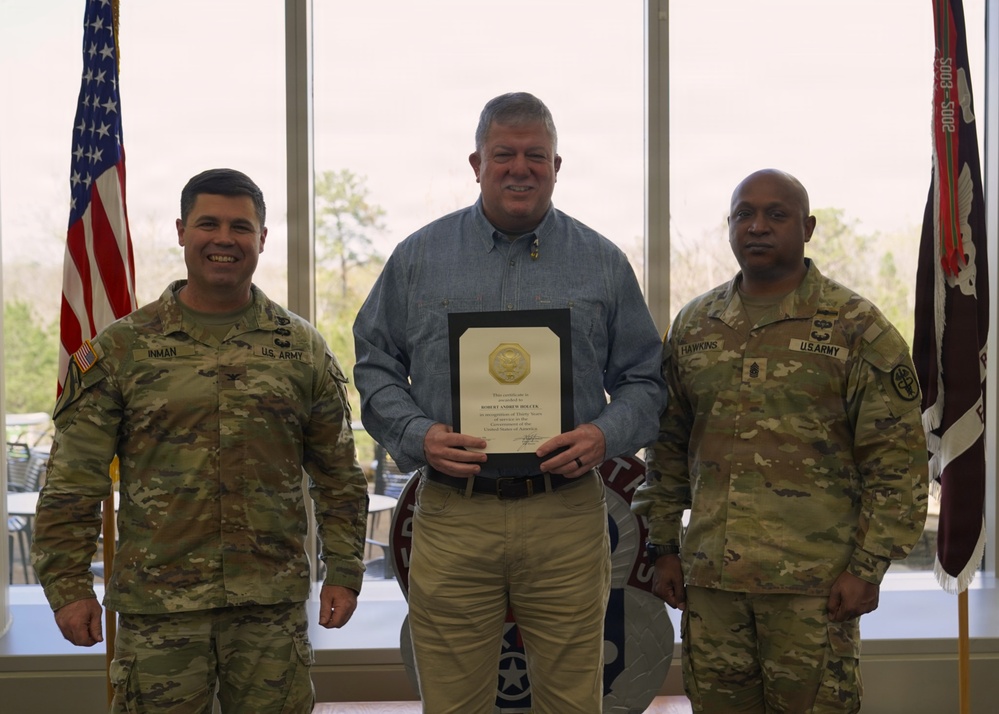 Soldiers and civilian staff from Martin Army Community Hospital are recognized during the hospital’s quarterly awards ceremony