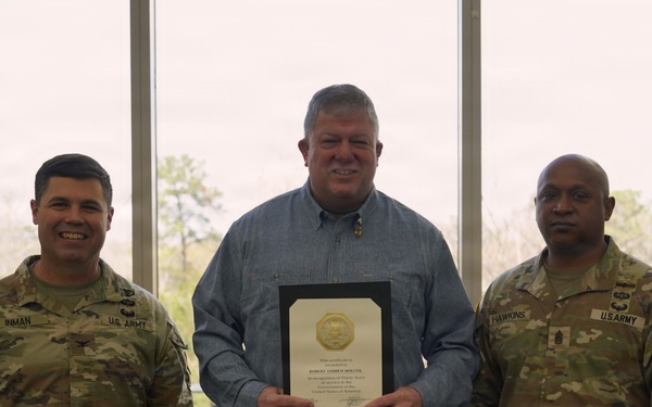 Soldiers and civilian staff from Martin Army Community Hospital are recognized during the hospital’s quarterly awards ceremony