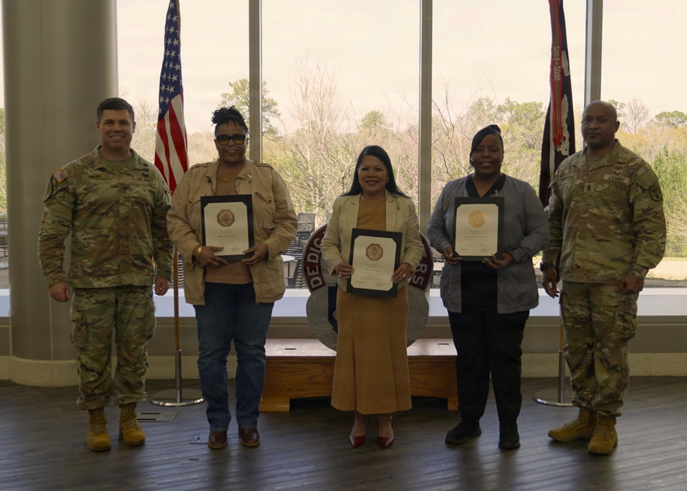 Soldiers and civilian staff from Martin Army Community Hospital are recognized during the hospital’s quarterly awards ceremony
