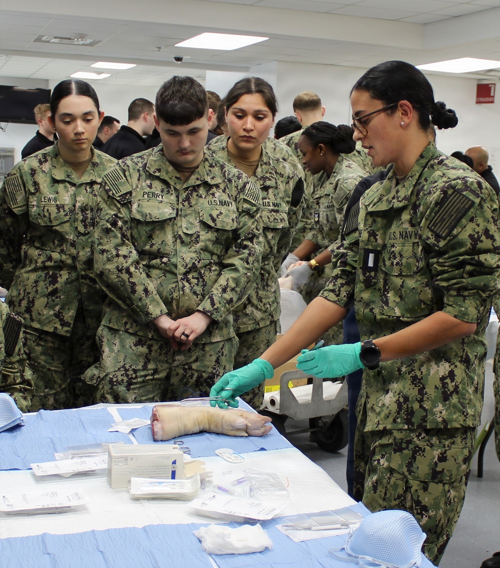 Corpsmen Receive Instruction During Suture Lab