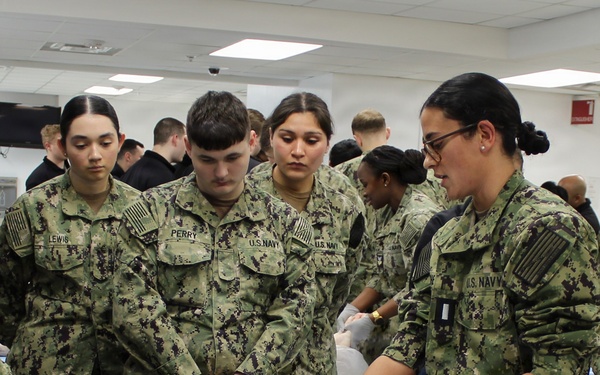 Corpsmen Receive Instruction During Suture Lab