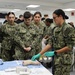Corpsmen Receive Instruction During Suture Lab