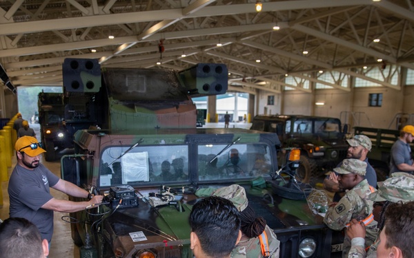 3-265 Air Defense Artillery Soldiers Install MILES on Vehicles at JRTC