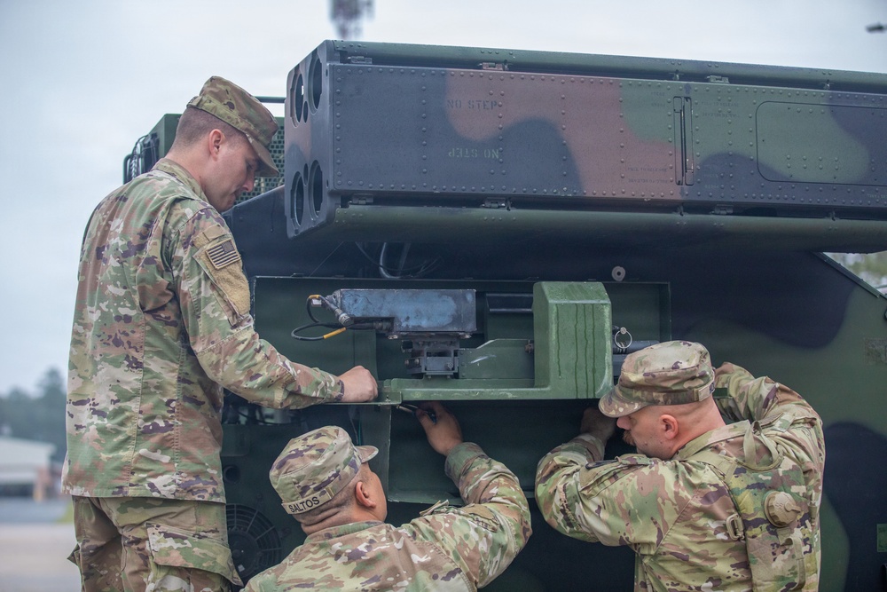 3-265 Air Defense Artillery Soldiers Install MILES on Vehicles at JRTC