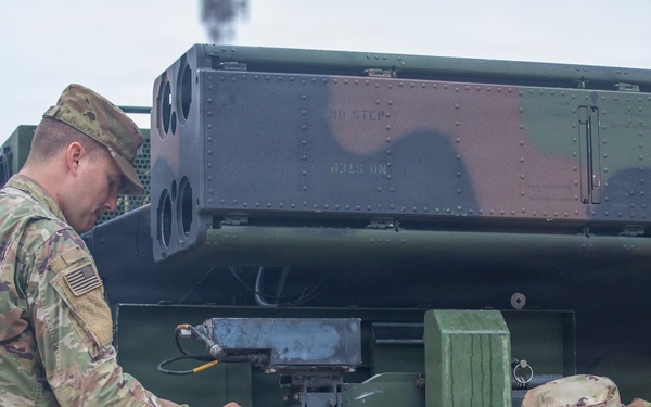 3-265 Air Defense Artillery Soldiers Install MILES on Vehicles at JRTC