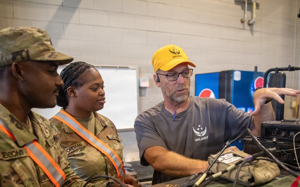 3-265 Air Defense Artillery Soldiers Install MILES on Vehicles at JRTC