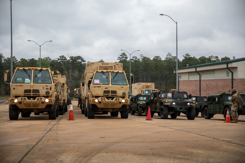 3-265 Air Defense Artillery Soldiers Install MILES on Vehicles at JRTC