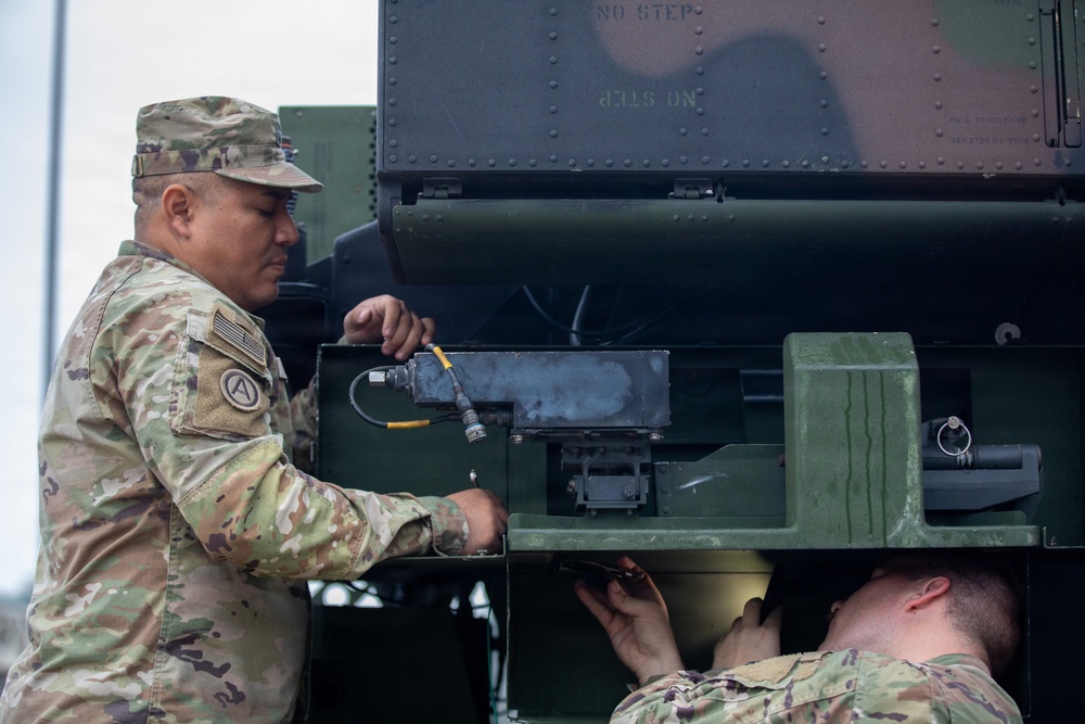 3-265 Air Defense Artillery Soldiers Install MILES on Vehicles at JRTC
