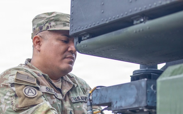 3-265 Air Defense Artillery Soldiers Install MILES on Vehicles at JRTC