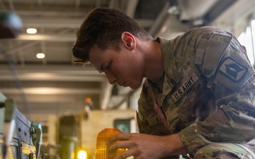 3-265 Air Defense Artillery Soldiers Install MILES on Vehicles at JRTC