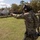 OC/T Focuses on Target while Shooting M17 at All Army