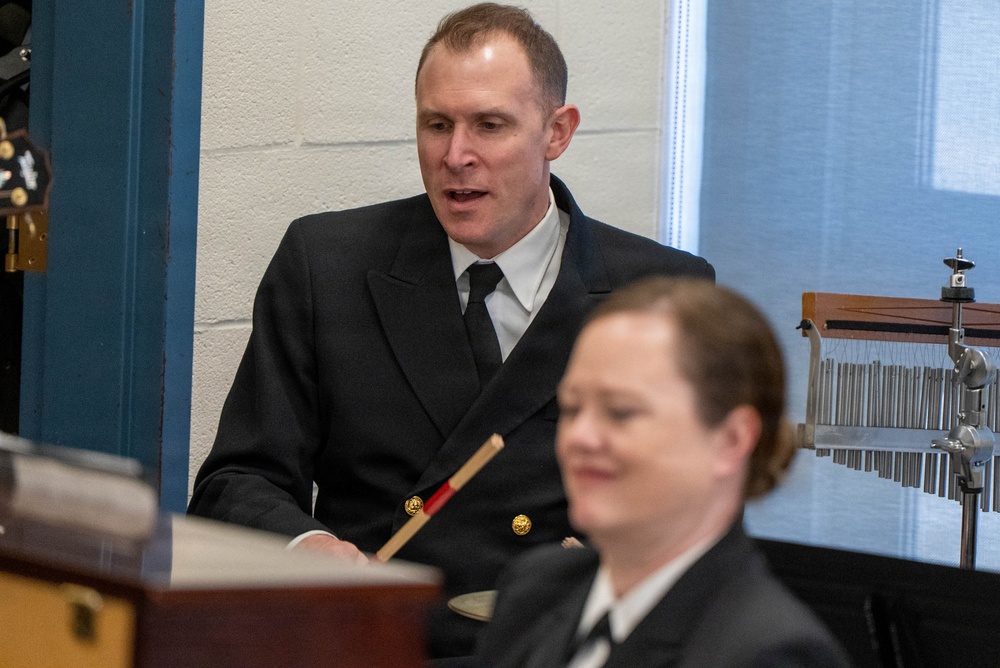 Musician 1st Class David Agee of the US Navy Band Sea Chanters perform at Schalmont High School