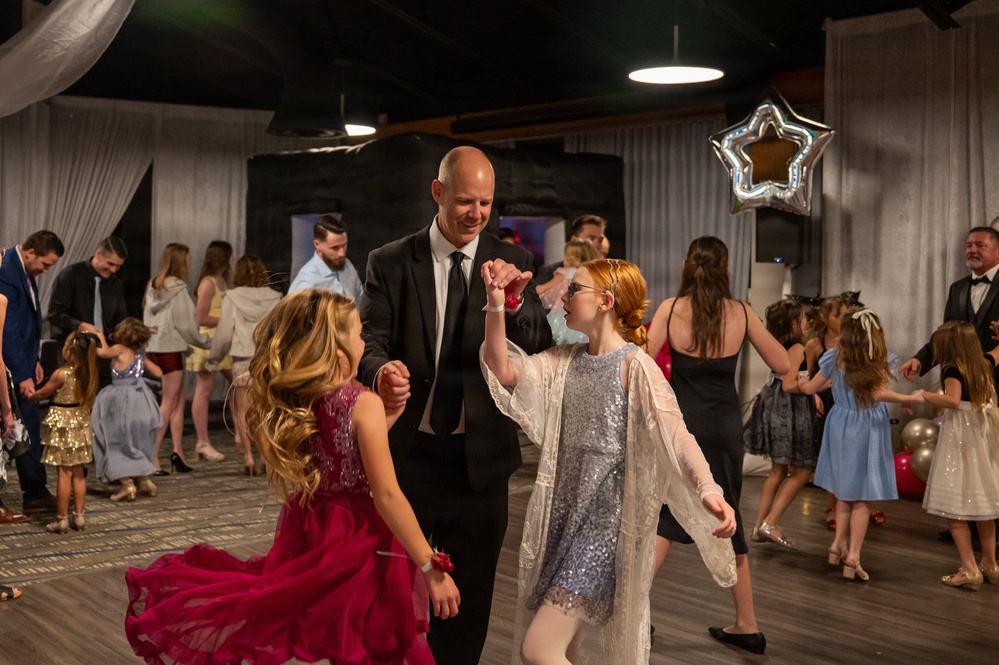 Strengthening Bonds: A Special Night for Service Members and Their Daughters