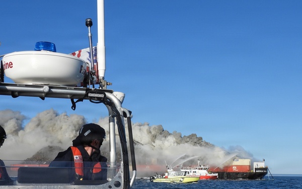 Coast Guard Cutter Lawrence Lawson maintains safety zone during Delaware Bay barge fire