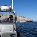 Coast Guard Cutter Lawrence Lawson maintains safety zone during Delaware Bay barge fire