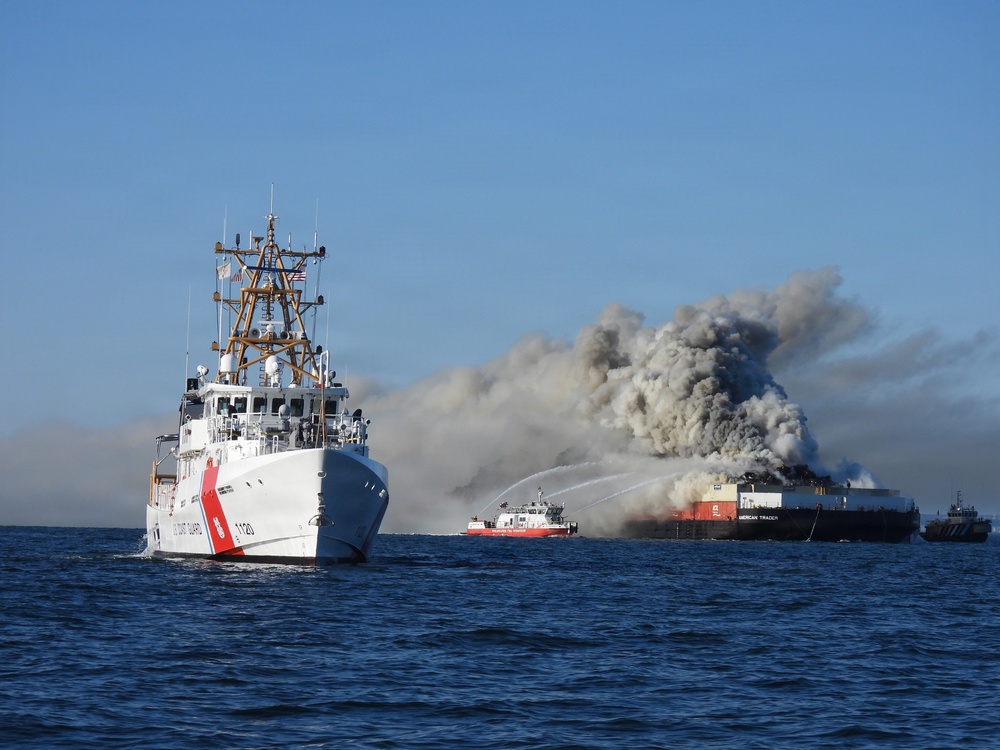 Coast Guard Cutter Lawrence Lawson maintains safety zone during Delaware Bay barge fire