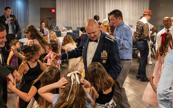Strengthening Bonds: A Special Night for Service Members and Their Daughters