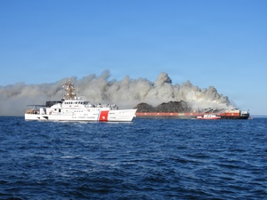 Audio Available: Coast Guard rescues 3 from barge off Point Judith