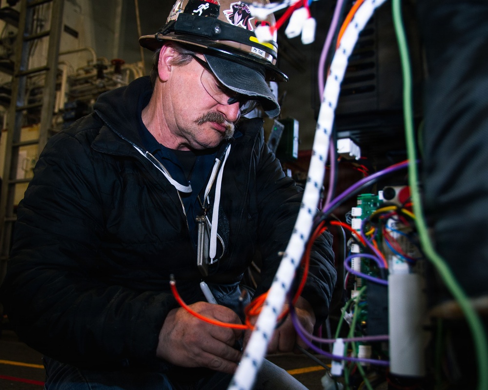 Ronald Reagan Contractors Conduct Maintenance