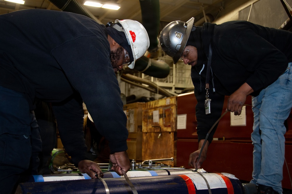 Ronald Reagan Contractors Conduct Maintenance