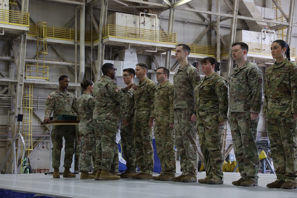 Soldiers, airmen exchange medals at ceremony