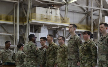 Soldiers, airmen exchange medals at ceremony