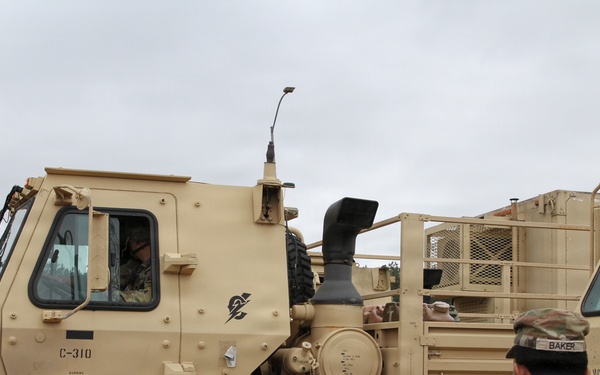 3-265th Air Defense Artillery Regiment Soldiers prepare installation of MILES gear