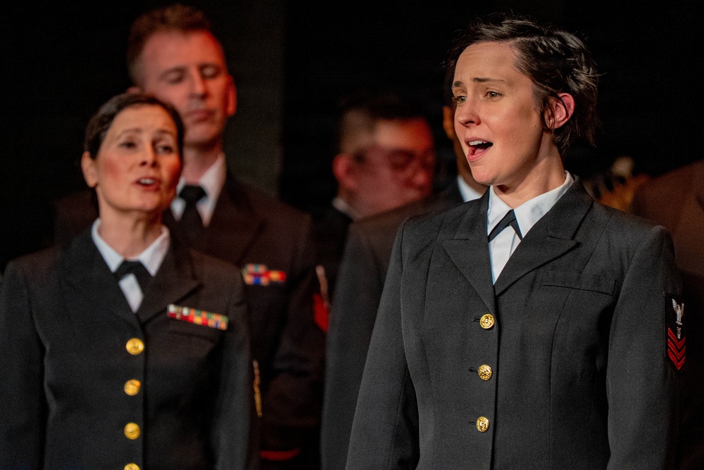 Musician 1st Class Alissa Suver performs with the US Navy Band Sea Chanters at the Earlville Opera House