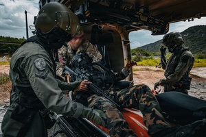 A MV-22 Osprey supporting USAID and JTF-Haiti delivers aid supplies in Troirac