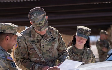 1AD CG reenlists MP